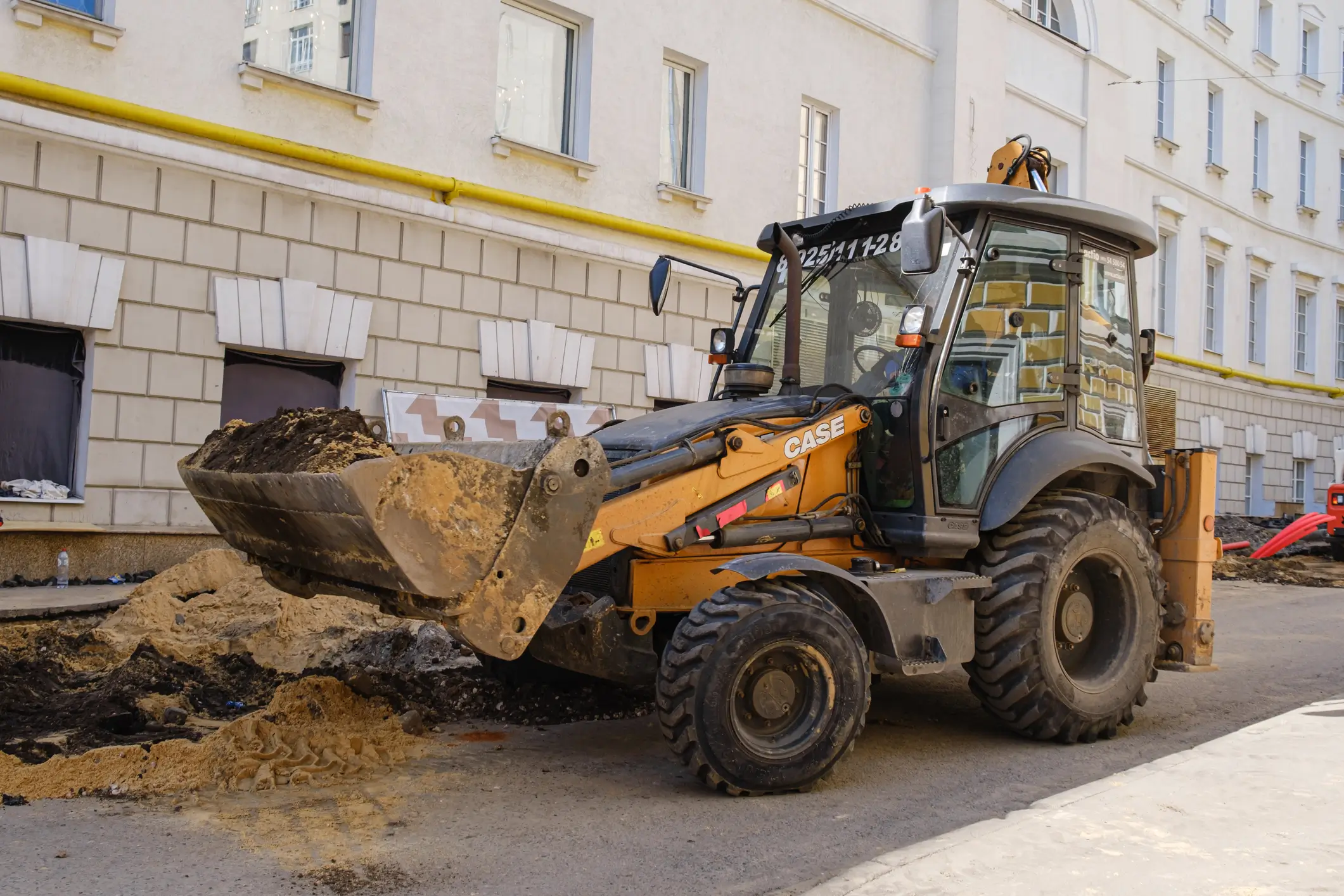 Bulldozer at urban construction site